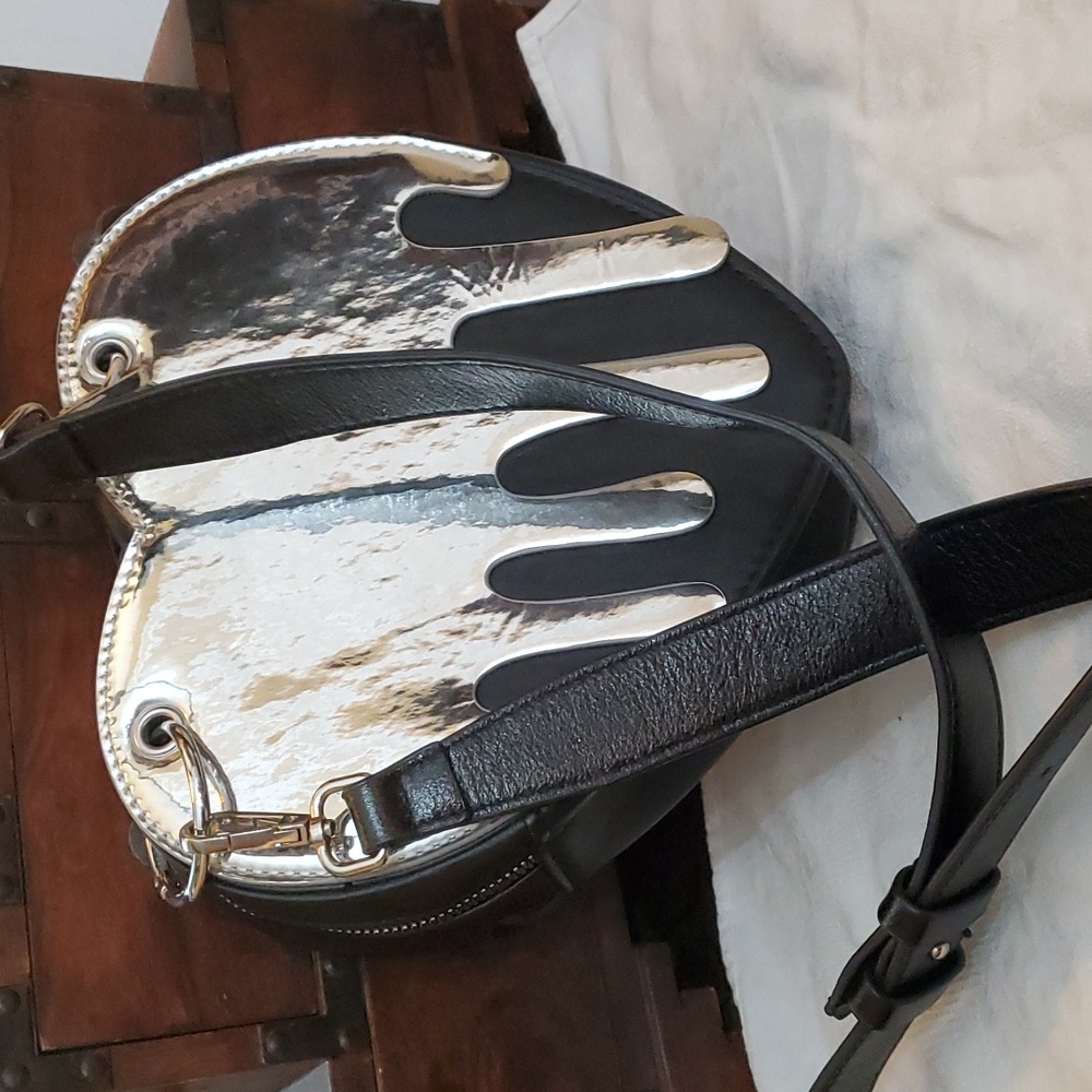 Heart shaped purse black with "dripping metal"